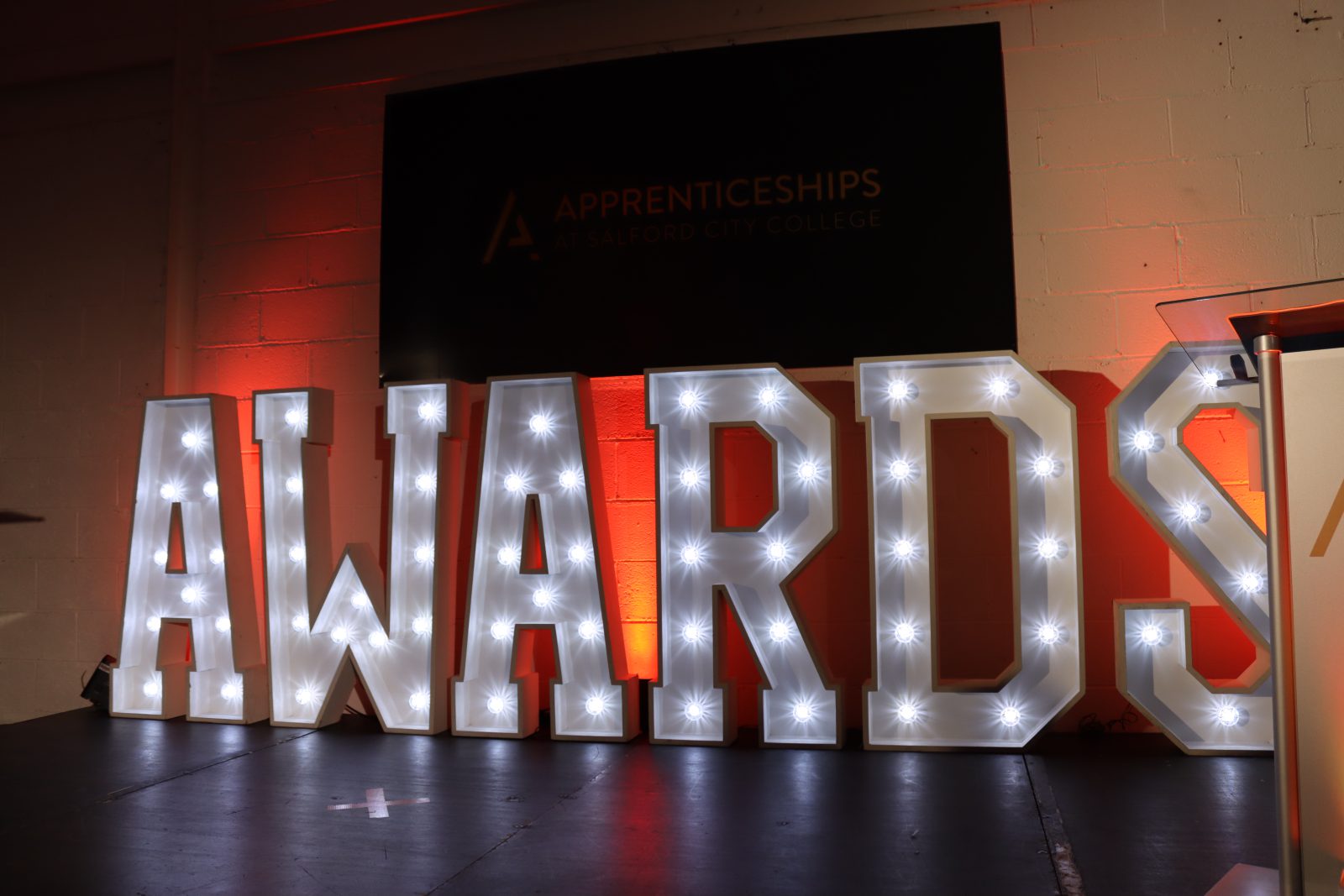 The light up awards sign at the event