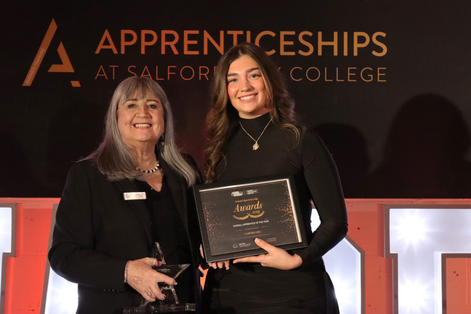 Niamh Mitchell posing with her award, Overall Apprentice of the Year